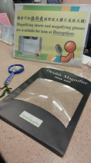 Portable magnifying sheets and magnifying glasses